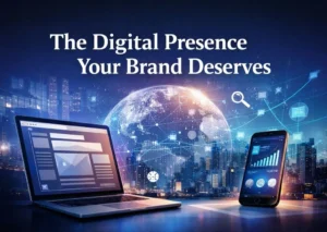 A high-tech digital illustration featuring a laptop and a smartphone on a reflective surface in the foreground. Between the devices, a glowing, translucent globe of Earth is connected by a web of blue light networks. The background displays a futuristic nighttime city skyline. White text at the top reads, "The Digital Presence Your Brand Deserves." Floating digital icons, including a magnifying glass, accent the scene in a blue and gold color palette.